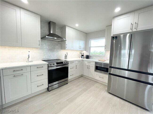 Building Photo - 12945 Vanderbilt Dr