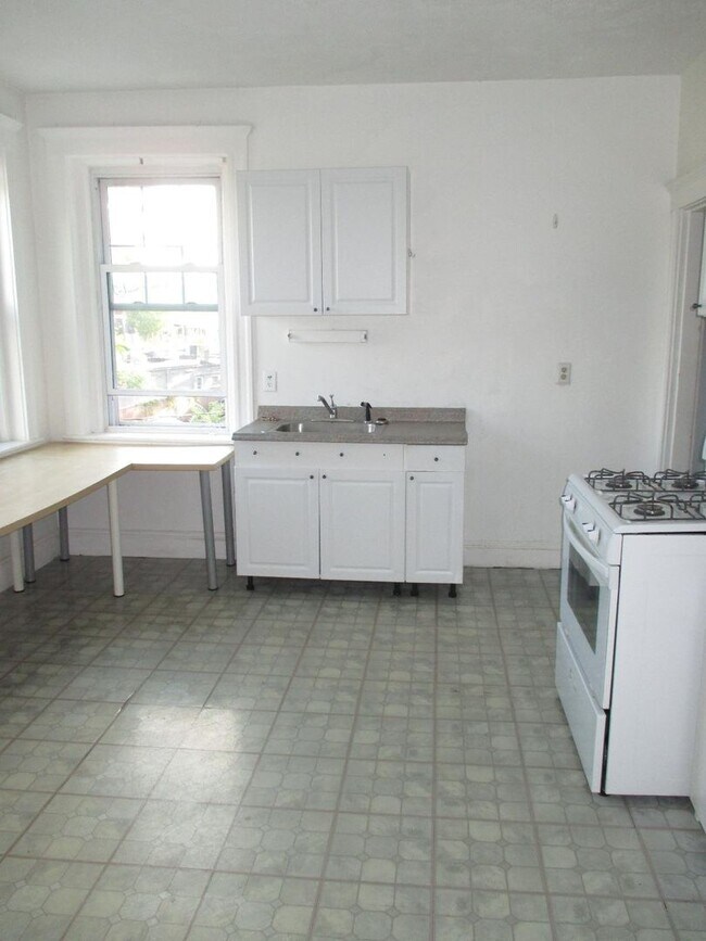 Building Photo - No brokers Fee, No Security Deposit, Heat, Hot Water Included, Steps from the T Stop