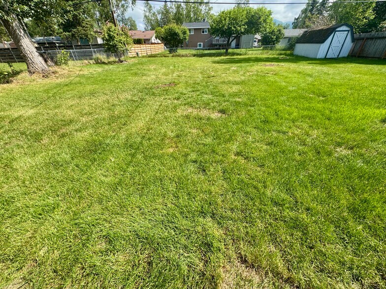 Looking across backyard from patio - 1503 Wolverine St
