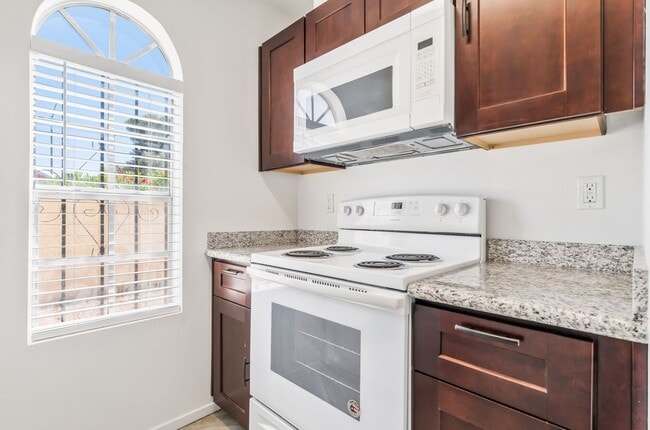 Building Photo - Modern Gated Condo Near the Strip with Pool & Covered Parking!
