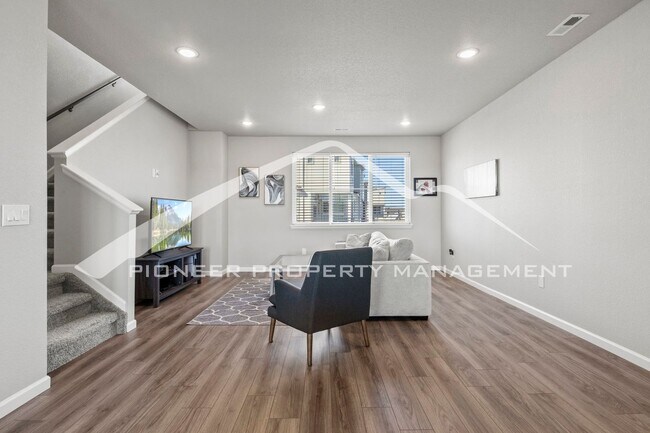 Building Photo - Contemporary Townhome in the Vibrant Interquest Low Maintenance Community with 2 car garage, Wash...