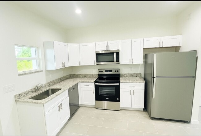 Building Photo - BRAND NEW 2/2/1- GREAT LOCATION-SW LEHIGH ACRES