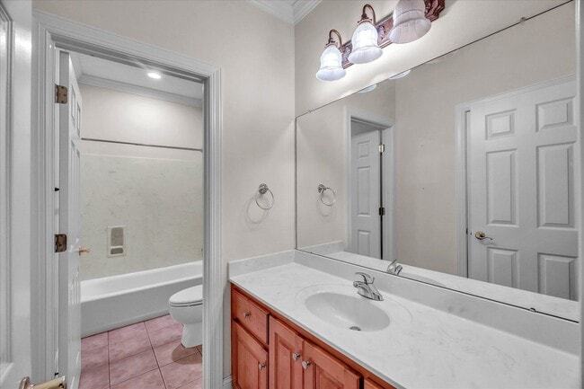 Building Photo - Stunning all-brick home on a large wooded lot
