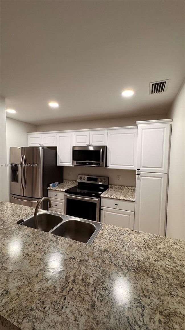 Building Photo - 3801 Cocoplum Cir