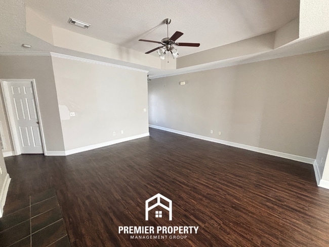 Building Photo - Charming 3BR Tuscaloosa Home | Hardwood Floors, Brick Fireplace, 2-Car Garage & Fenced Yard