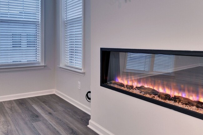 Building Photo - Three Story Brick End Unit with Rooftop Terrace