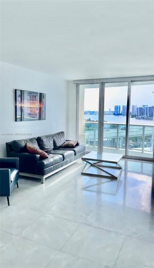 Building Photo - 19380 Collins Ave