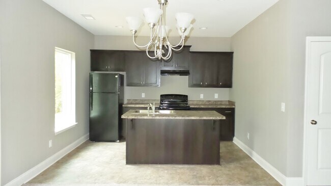 Building Photo - Home with Private Back Yard Available For ...