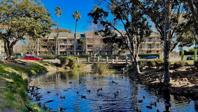 Exterior condo building faces park. - 532 Ebbtide Cir