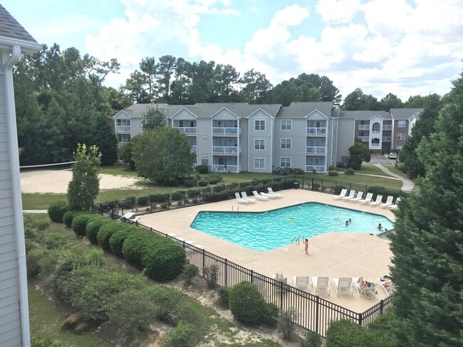 Building Photo - Pool View Unit! Cape Cottages Coastal 3 be...