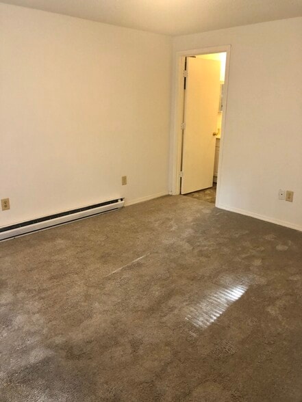 Bedroom has new neutral carpet. - 1026 Danwood Ln