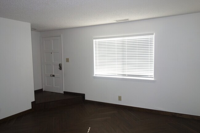 Living room view looking towards front door - 3421 E 35th St
