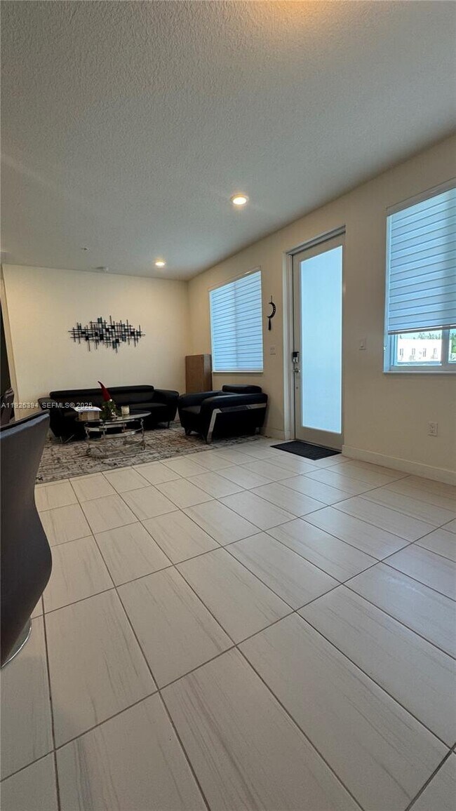 Building Photo - 6416 NW 102nd Ct