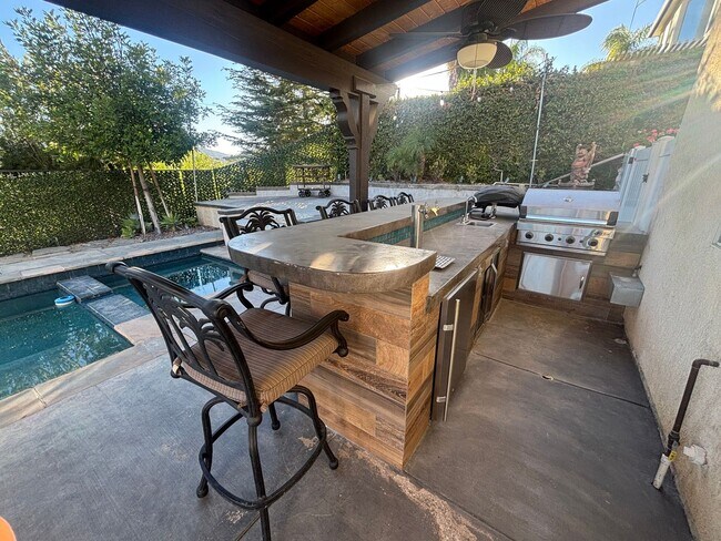 Building Photo - Stunning 5-Bedroom Pool Home with Private ...