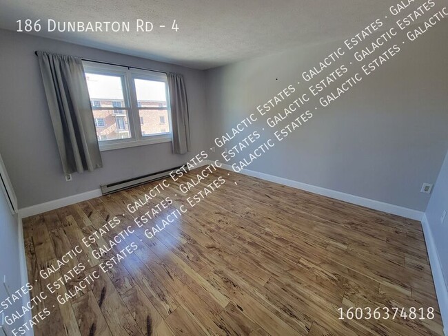 Building Photo - 2 bed 1 bath townhouse with under garage p...