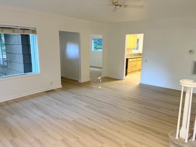 living room looking to flex room and main entry - 4662 Carman Dr