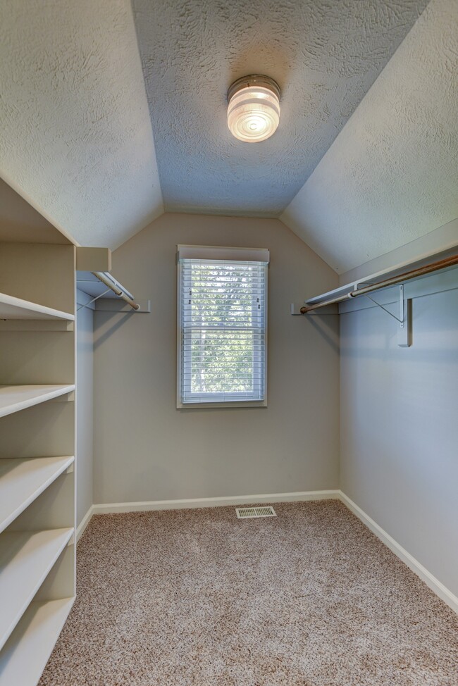 Primary bedroom walk-in closet - 705 N 75th St