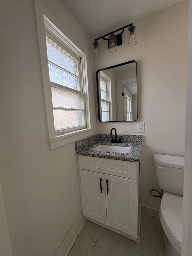 Building Photo - Fully Renovated 3BR/1.5BA – Prime Location + Lawn Care Included