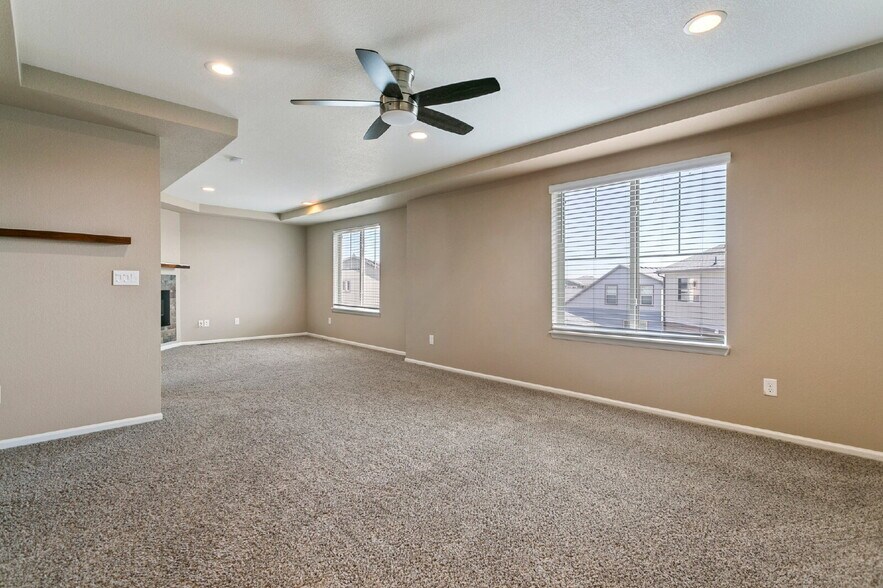 Building Photo - Spacious Banning Lewis Home with Finished ...