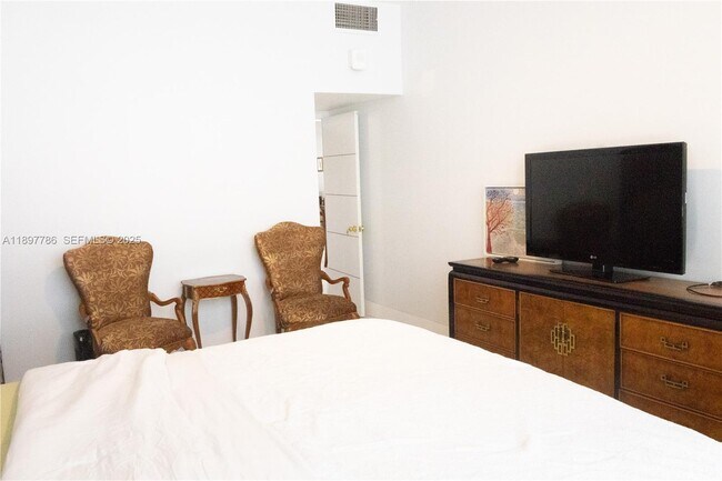 Building Photo - 5005 Collins Ave