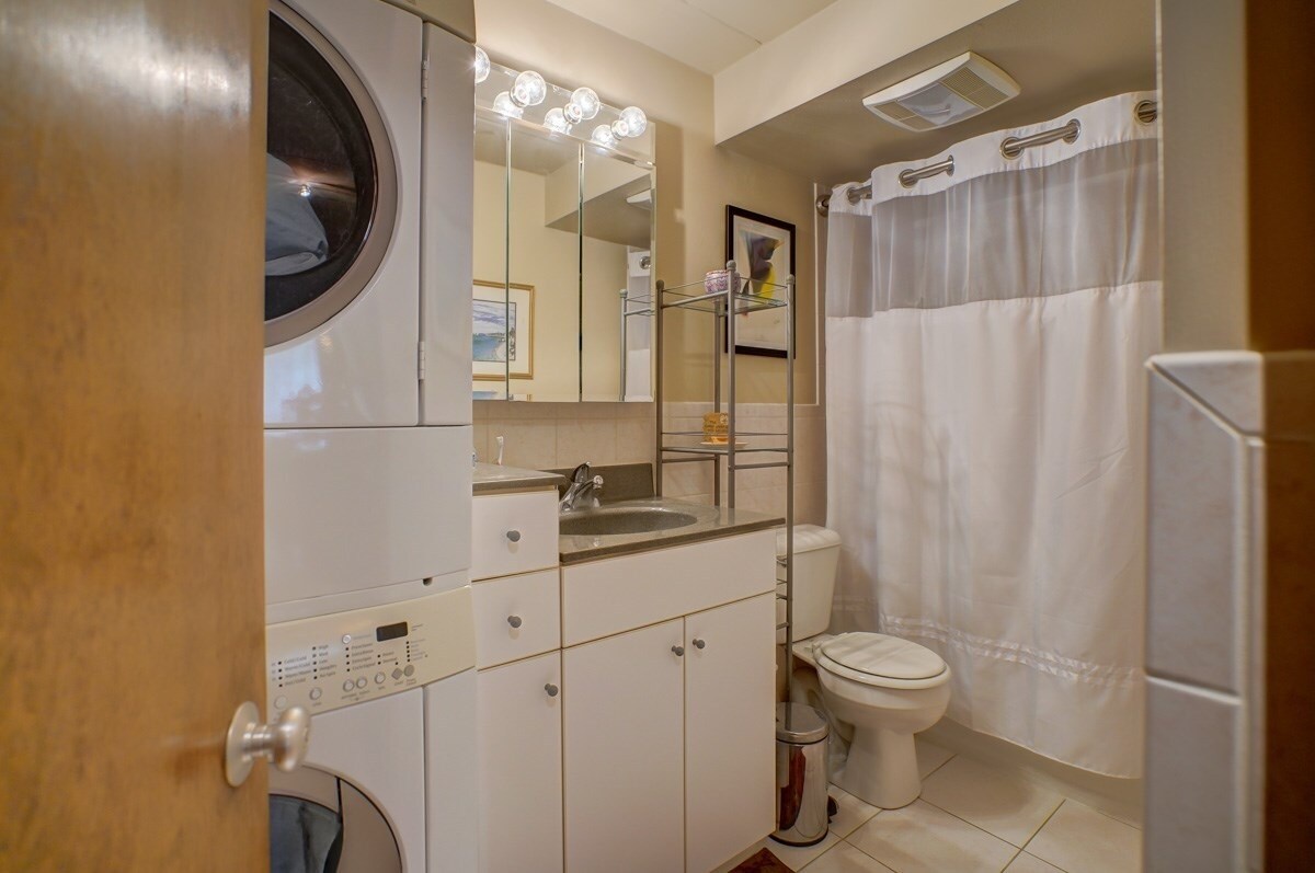 Full bathroom with washer and dryer - 2051 Allen Blvd