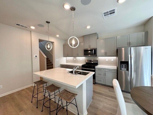 Building Photo - Brand New 4 Bedroom Home with Solar in Gat...