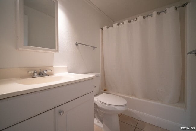 Building Photo - This 2 bedroom, 1 bathroom unit is on the 2nd story in the Makaha Valley Plantation condos. It is...