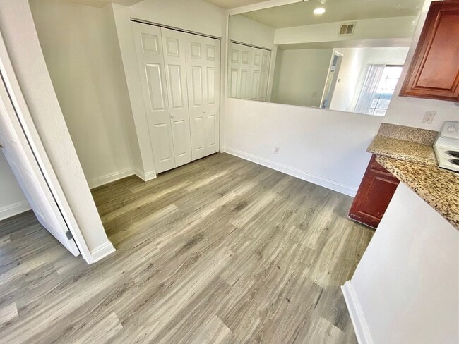 Building Photo - CONDOMINIUM IN A GATED COMMUNITY WITH 2 BE...