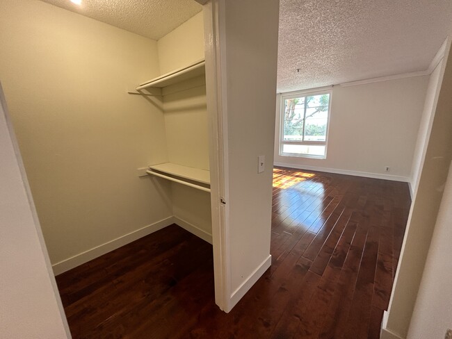 walk-in closet in main bedroom - 10811 Ashton Ave