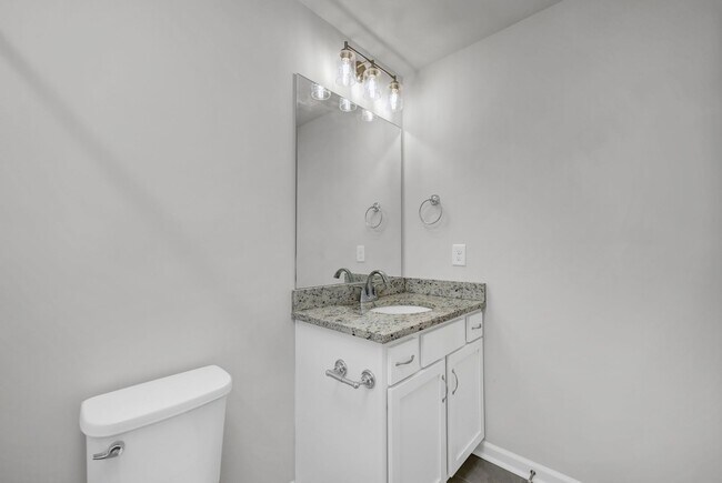 Building Photo - Sophisticated Like-New 4-Bedroom Home with Designer Finishes & Fenced Backyard!