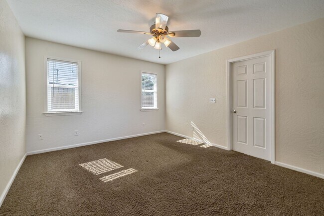 Building Photo - 3BR + Office Home in Excellent Condition with Storage Sheds and Garage Workspace!