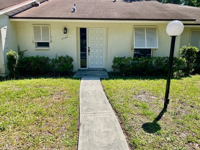 Building Photo - 5340 Royal Palm Ave