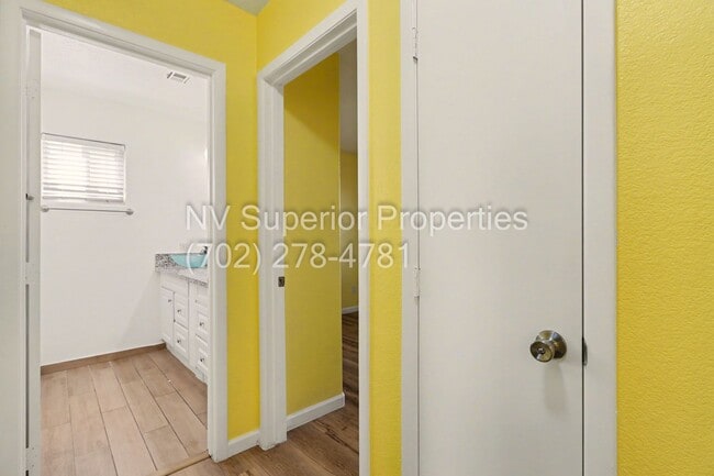 Building Photo - NW!! 4 Bedrooms!!! All Tile and Pergo flooring T/O!! NO Carpet!!! Low Maintenance Desert landscap...