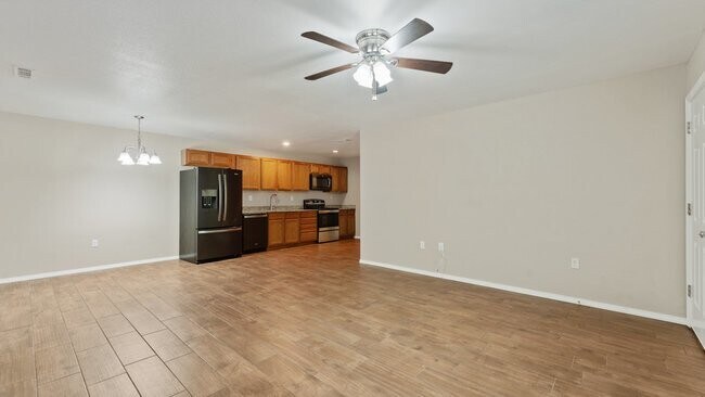 Building Photo - "Spacious 3-Bedroom Duplex in Prime Spring...