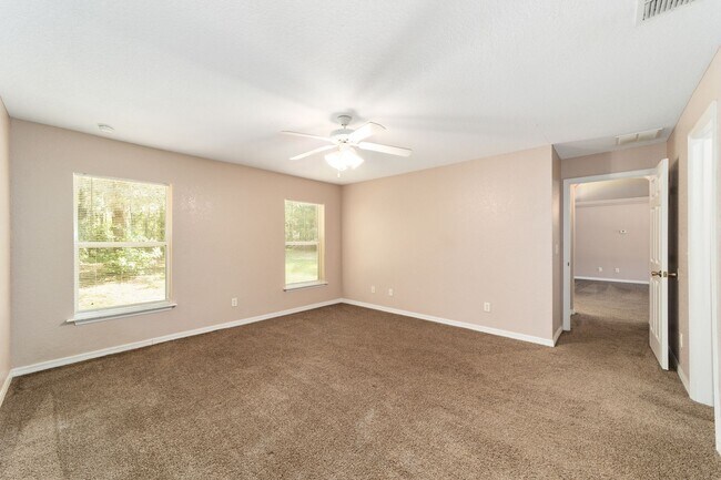 Building Photo - Peaceful 3-Bedroom Home with Open Floor Plan & Two-Car Garage in Rainbow Lakes Estates!