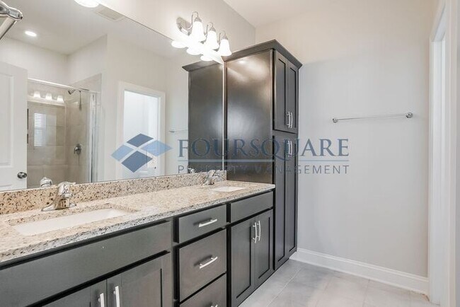 Building Photo - Spacious  End-Unit Townhome | Rear Deck & 2-Car Garage  | Near Brier Creek