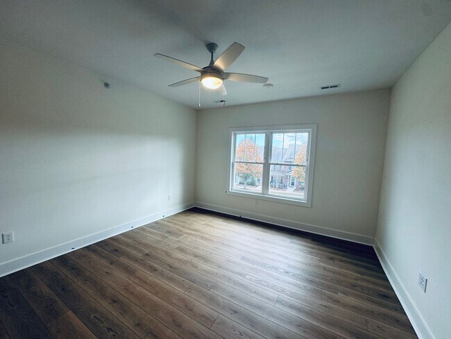 Building Photo - Brand New Luxury Condo - Top Floor