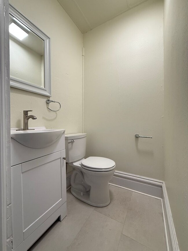 Building Photo - Now showing updated 4BR 1.5 bath house!