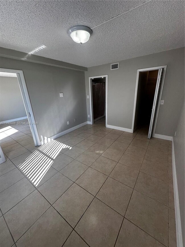 Building Photo - 6565 W 26th Dr