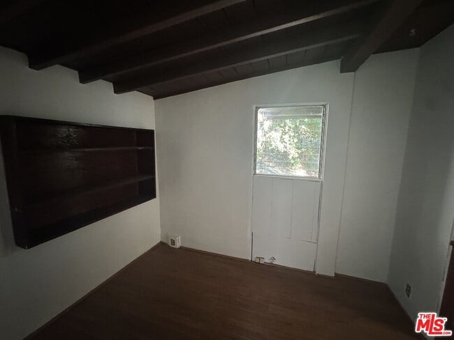 Building Photo - 825 N Beverly Glen Blvd