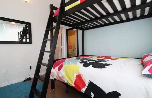 Building Photo - Stunning Duplex with Wrap Around Deck - Available Now