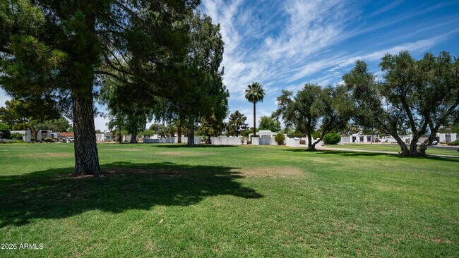 Building Photo - 648 E Tam O Shanter Dr