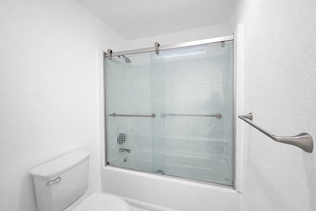 Building Photo - Executive 3 Bed Home with 3 Car Garage & Private Fenced Yard