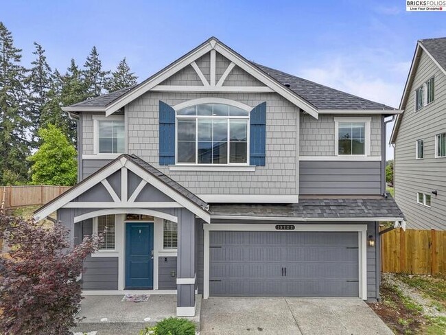 Building Photo - Your Ideal Home in Puyallup Awaits – Peace...