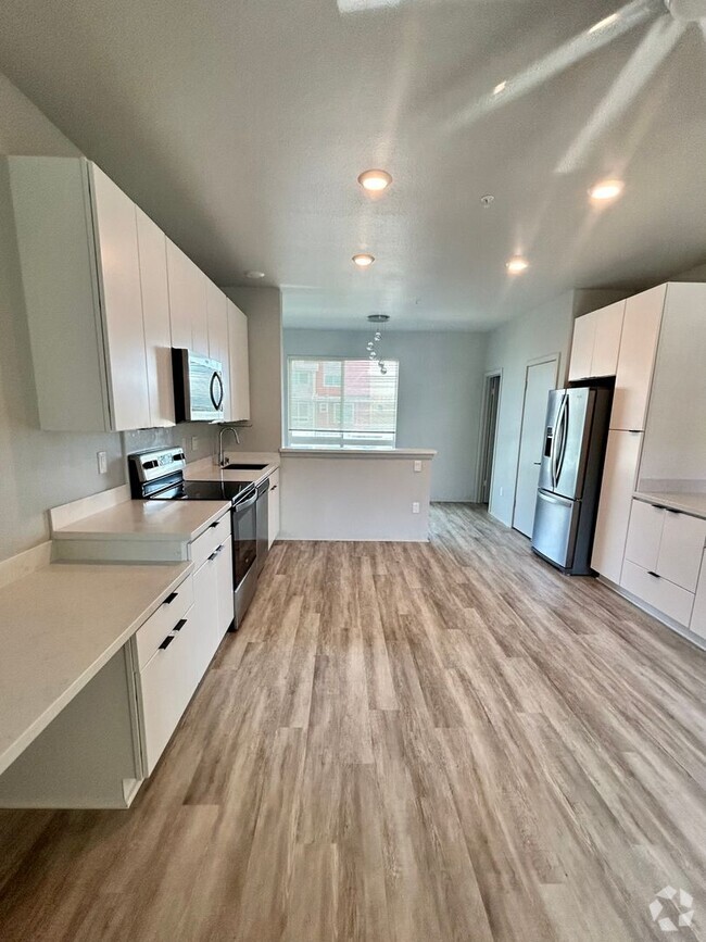 Building Photo - Available Now 2 Bedrooms 1.5 Baths 2 Assig...