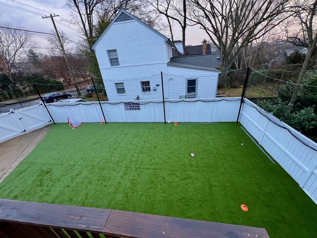 Backyard: Turfgrass and sports netting (optional). Perfect for kids! - 3227 45th St NW