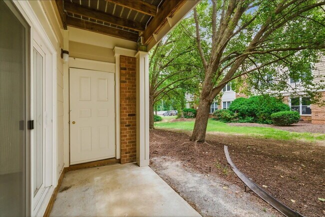 Building Photo - Commuter’s Paradise! Ground-Level 2BR Condo  Welcome home to this stunning, sun-filled 2-bedroom ...
