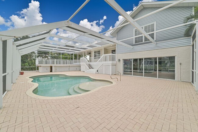 Building Photo - **Direct Gulf Access Pool Home! 4 BED/3 BA...