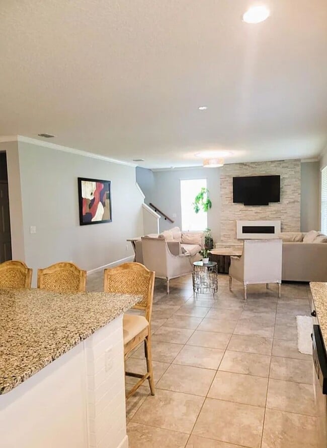 Building Photo - Spacious 4-Bedroom Home in Amelia Walk wit...