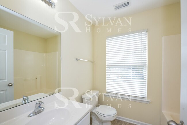 Building Photo - Spacious 4BR 2.5BA Home